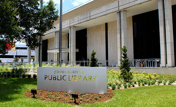Lawn and signage in front of John F. Germany Public Library