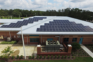 Aerial view of Arthenia L. Joyner Library with solar panels on roof
