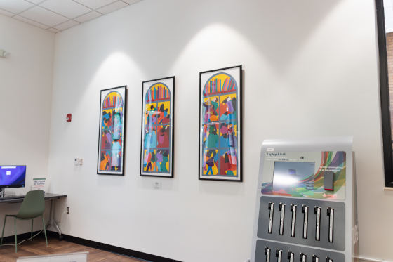 Paintings and laptop dispenser